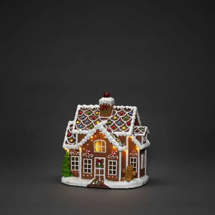 Gingerbread house Christmas village scene and tabletop decor