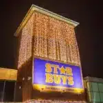 Connectable curtain lights 6m warm white with ice white flash front view