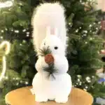 Fluffy squirrel with pine cone indoor Christmas decoration 44cm tall front angle