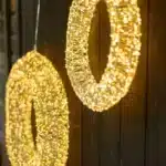 Pre-lit gold frame Christmas wreath 60cm diameter with 3000 warm white LEDs outside view