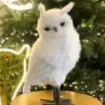 Winter furry owl with pointed ears Christmas decoration indoor display