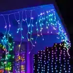 Twinkly Plus RGB and warm white 250 pixel LED icicle lights house installation outside display