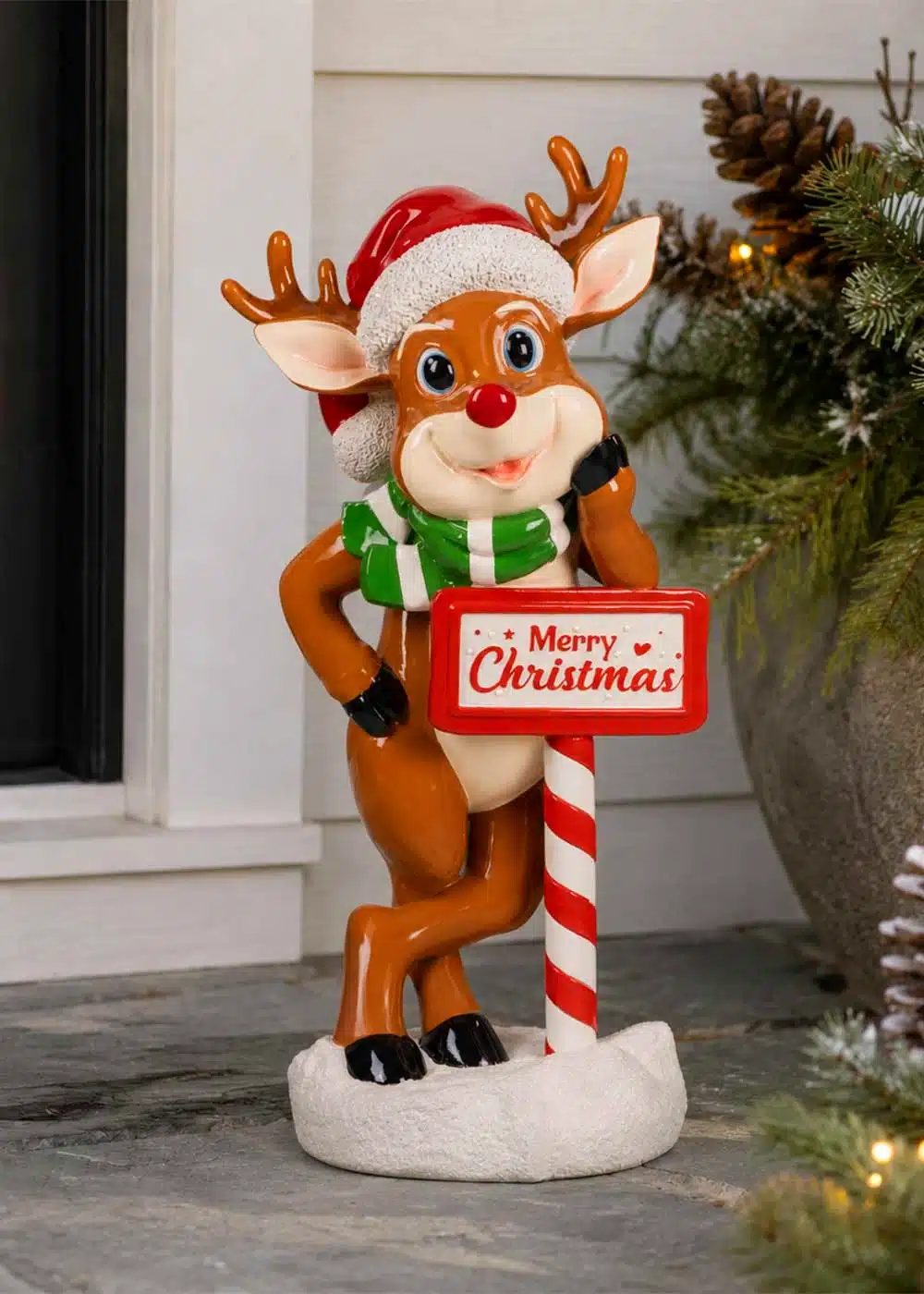 Illuminated Christmas reindeer decoration with a festive sign